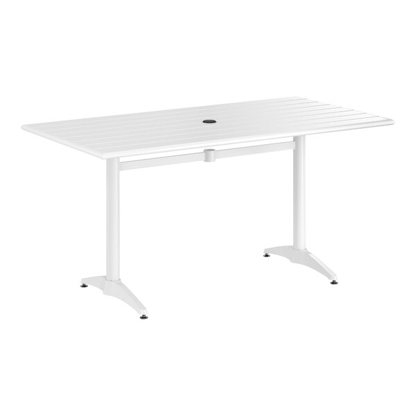 A white table with a black circle on top.