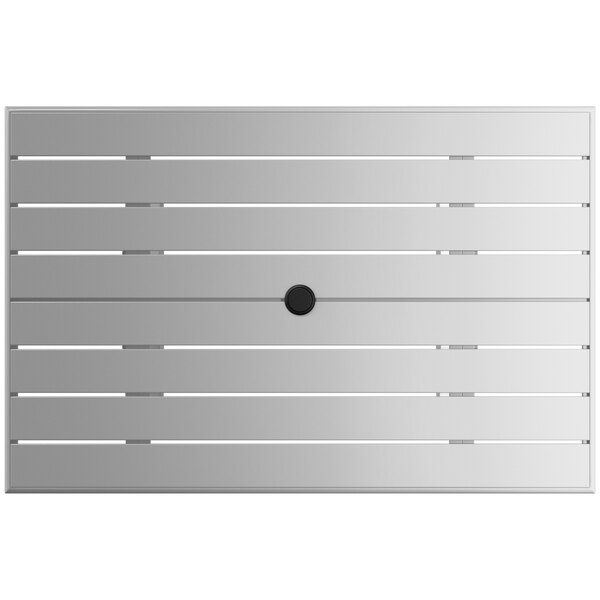 A white rectangular table with a black circle in the middle.