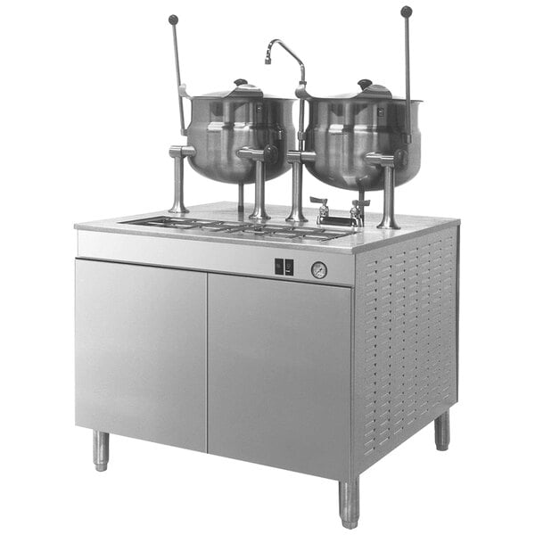 A Cleveland modular base with (2) 10 gallon steam kettles.