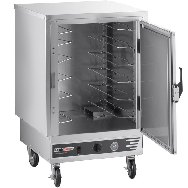 A large stainless steel ServIt holding cabinet with a solid door open.