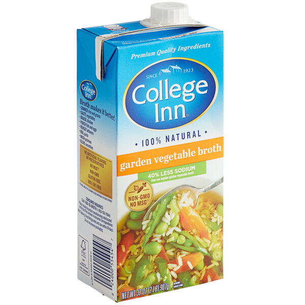 A carton of College Inn Less Sodium Vegetable Broth.