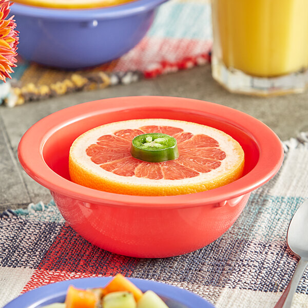 a close up of a glass of orange juice