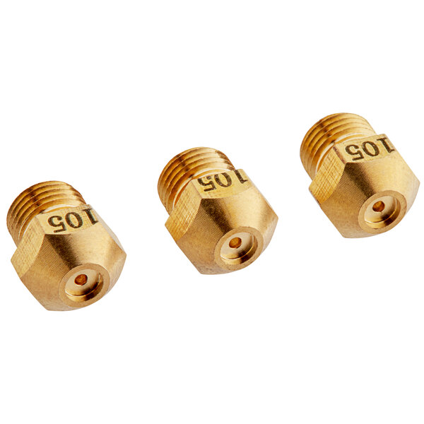 A group of three brass threaded fittings with numbers on them.