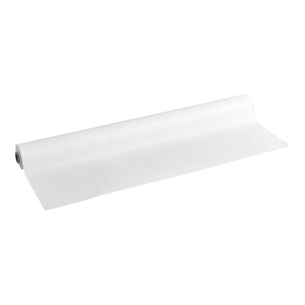 A roll of white material partially unrolled on a plain background.