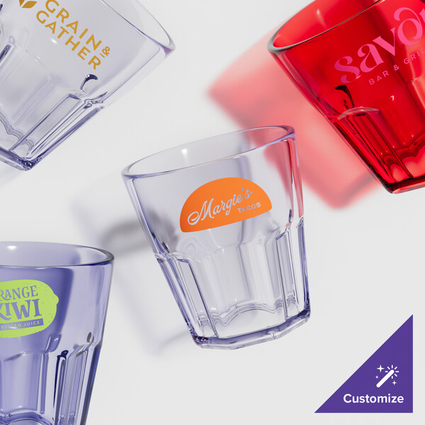 A close-up of a blue GET Bahama plastic tumbler with text on it.