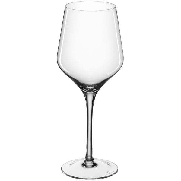 A close-up of a Della Luce clear wine glass with a stem.
