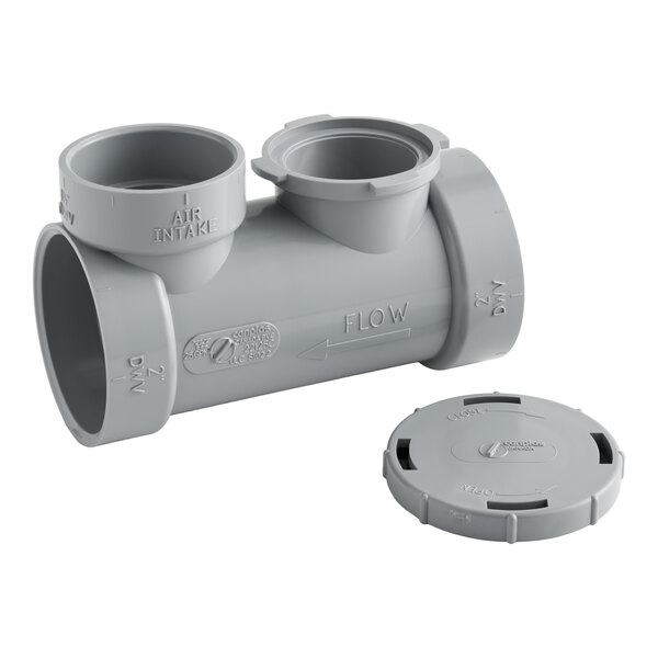 A gray plastic grease trap with multiple threaded connections and a removable lid.