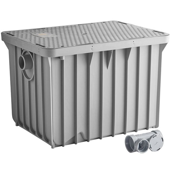 A gray plastic Endura grease trap with pipes and a lid.