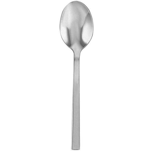 A close-up of a Walco stainless steel demitasse spoon with a Fieldstone finish.