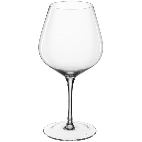 A close-up of a clear Della Luce Maia burgundy wine glass with a stem.