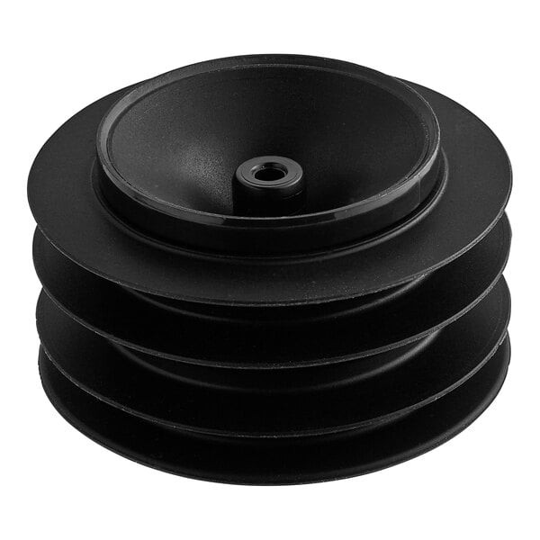 A black round plastic object with a hole in it.