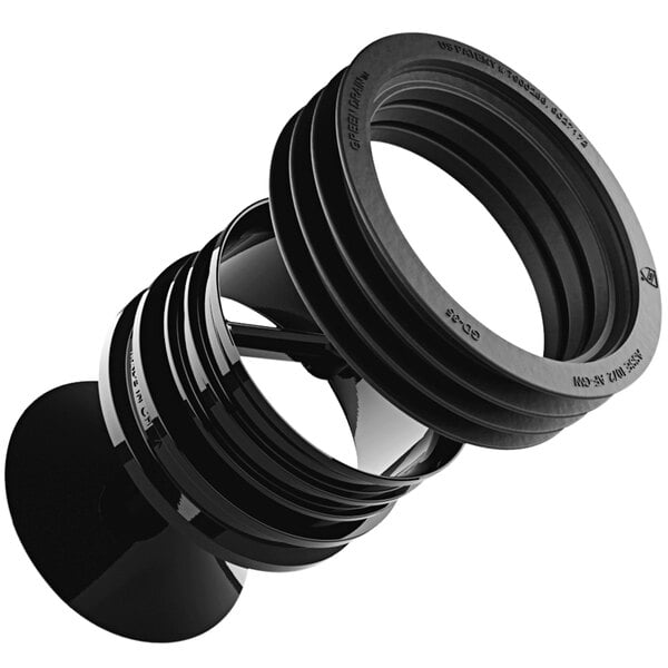 A black plastic tube with rings and a hole in a black object.