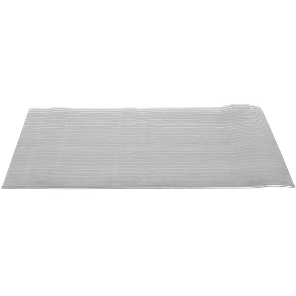 A close-up of a gray ribbed Tredlite anti-fatigue mat.