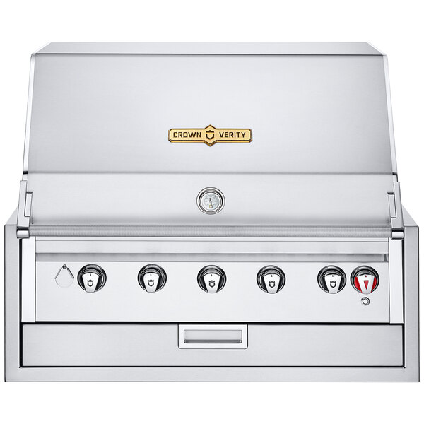 A stainless steel Crown Verity built-in grill with knobs.