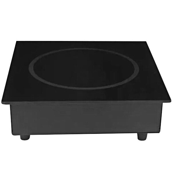 A black rectangular object with a white circle on it.