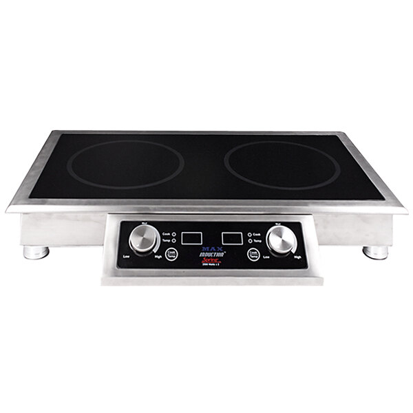 A stainless steel Spring USA double induction range on a countertop.