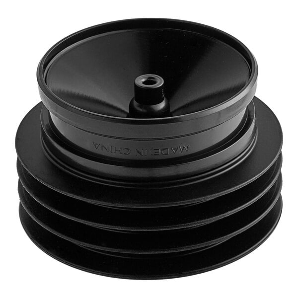 A black circular Green Drain GD3 waterless trap seal with a hole in the center.