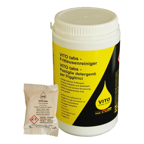 A yellow container with black text for VITO fryer cleaning tabs next to a small packet.