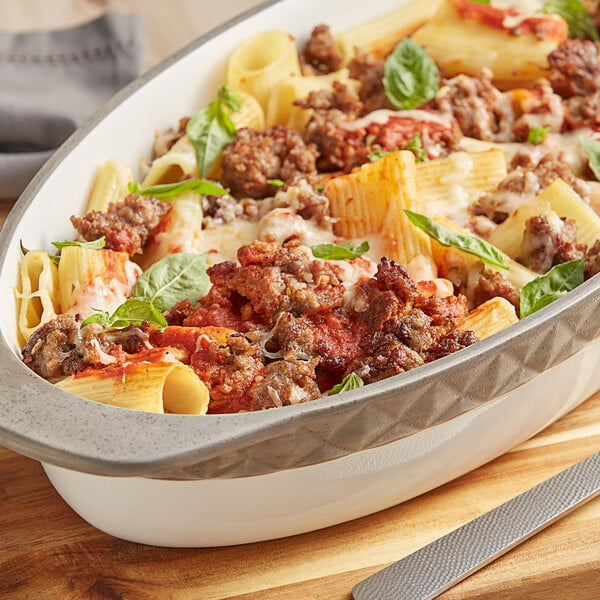 A bowl of pasta with Warrington Farm Meats sweet Italian sausage.