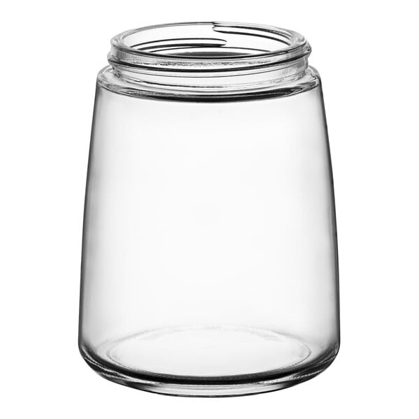 A clear glass Vollrath syrup server jar with a black lid.