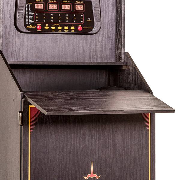 A black and red Arachnid CricketPro electronic dart game in an arcade style cabinet.