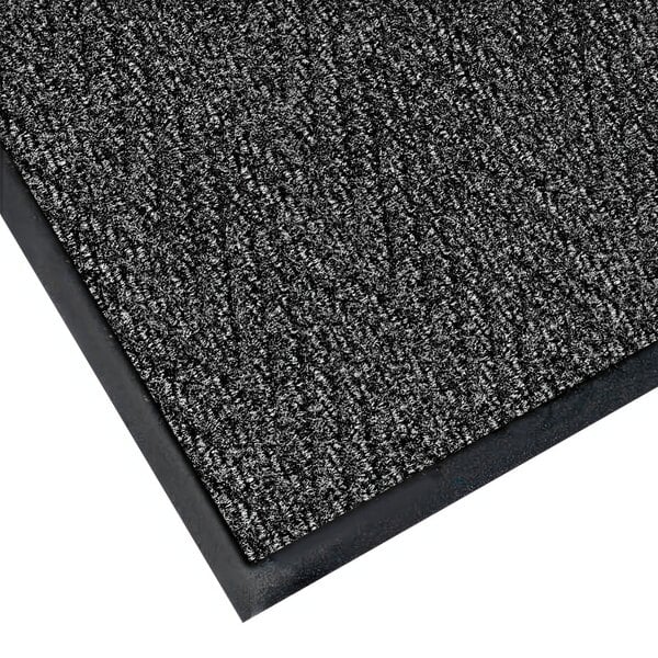 A black and gray Lavex Chevron Rib carpet mat with a black border.