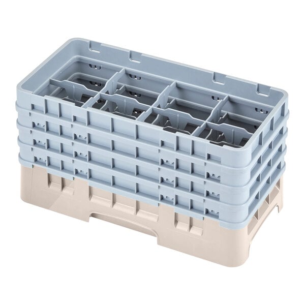 A beige plastic Cambro glass rack with eight compartments.