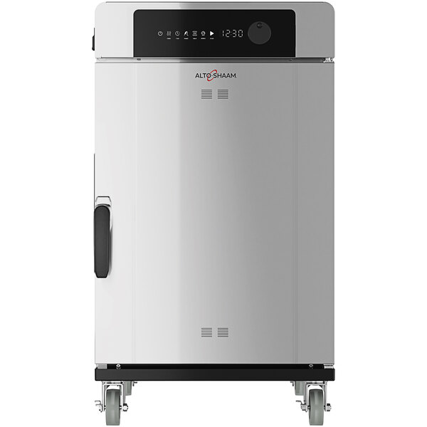 A large stainless steel Alto-Shaam Cook and Hold Smoker Oven with wheels.