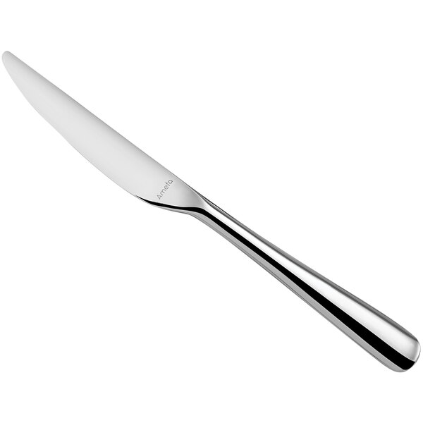 An Amefa stainless steel table knife with a silver handle.