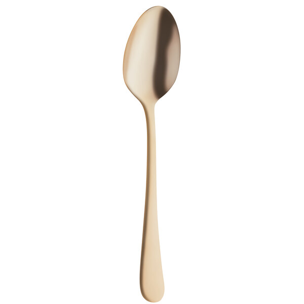 An Amefa stainless steel dessert spoon with a gold handle.