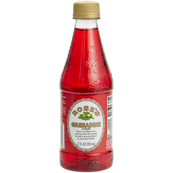 A bottle of Rose's grenadine syrup with a label on it.