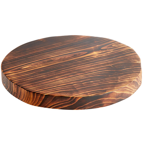 a circular wood surface with a white background