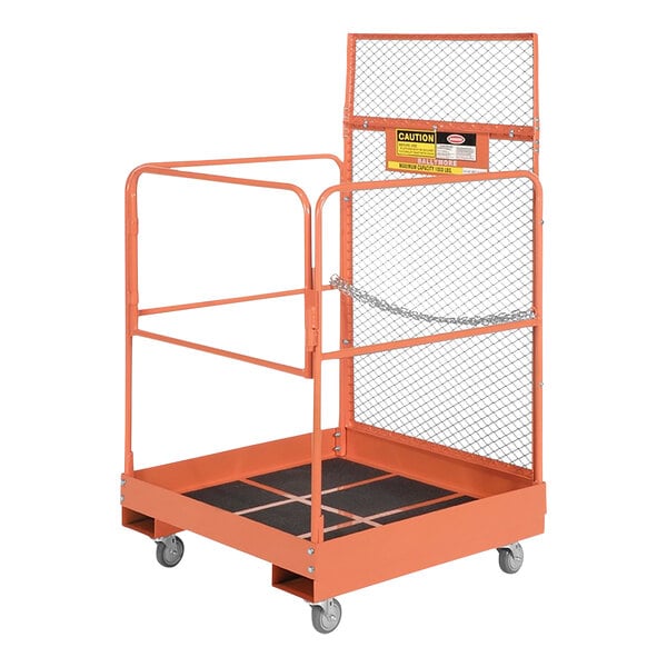 An orange metal forklift maintenance platform with chain link guard rails.