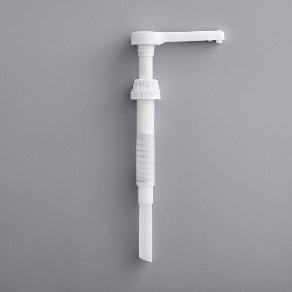 a white plastic pump with a white handle