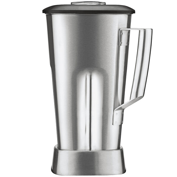 A silver blender container with a black handle.