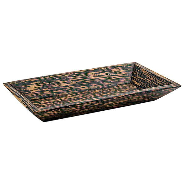 A rectangular Front of the House palm wood plate with brown stripes on a table.