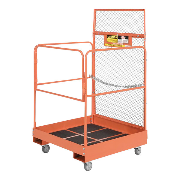 An orange metal forklift maintenance platform with chain link guard rails.