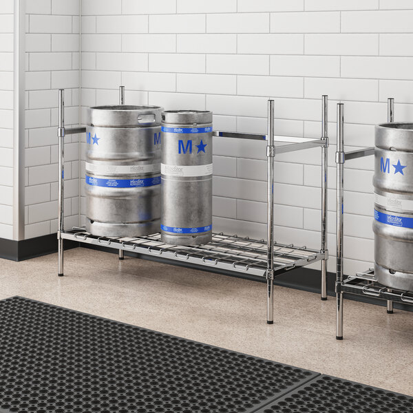 A Regency metal rack holding three kegs.