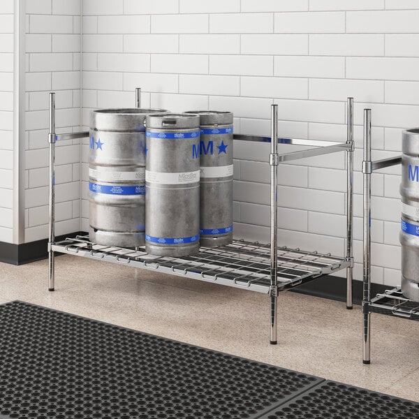 A Regency metal keg rack with barrels on it.