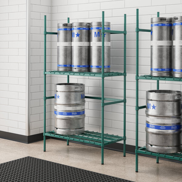 A Regency metal rack with green epoxy shelves holding four kegs.