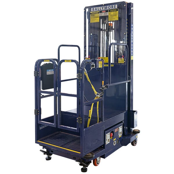 A blue Ballymore battery-powered hydraulic personnel lift with a yellow handle and safety frame.