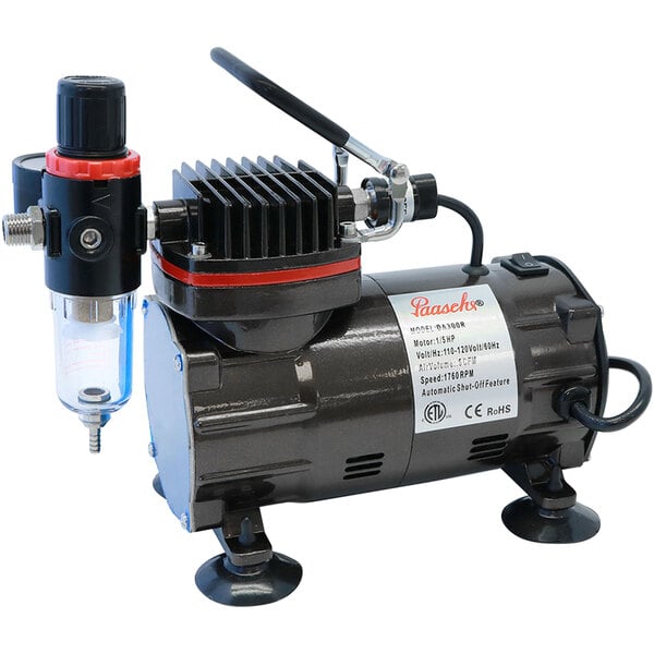 A black and red Paasche DA300R air compressor with a hose attached.