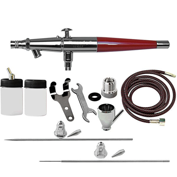 A black and silver Paasche airbrush with tools and accessories, including white bottles with black lids.