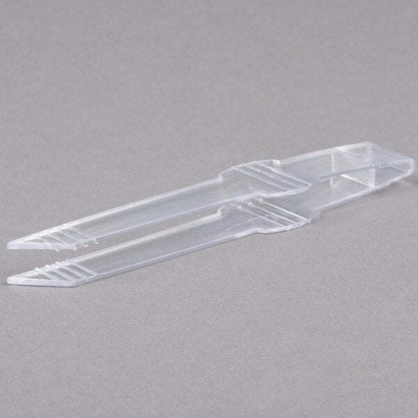 Clear plastic tweezers.