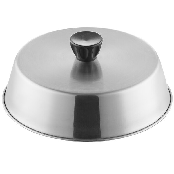 A stainless steel American Metalcraft basting cover with a black handle.