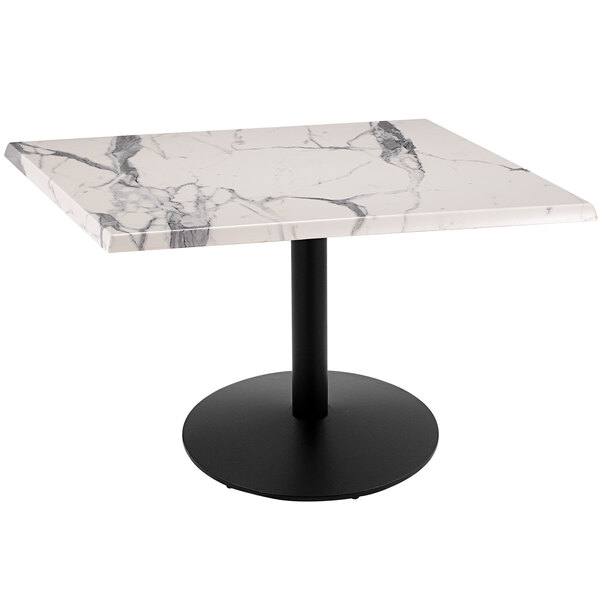 A white marble table with a black base.