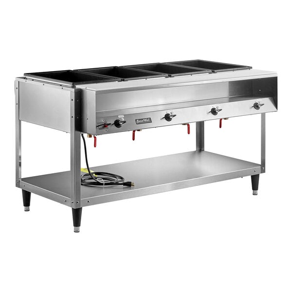 A Vollrath stainless steel electric hot food table with four pans on a stand.