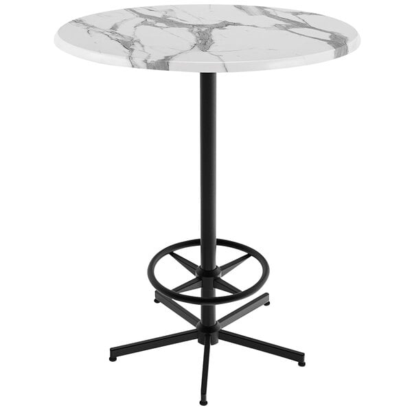 A round white marble Holland Bar Table with a black base.