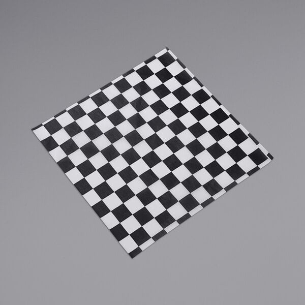 A black and white checkered paper with the American Metalcraft logo.