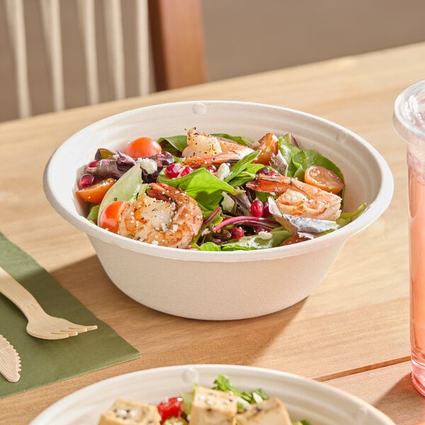 A white 32 oz. compostable fiber bowl filled with salad and shrimp.